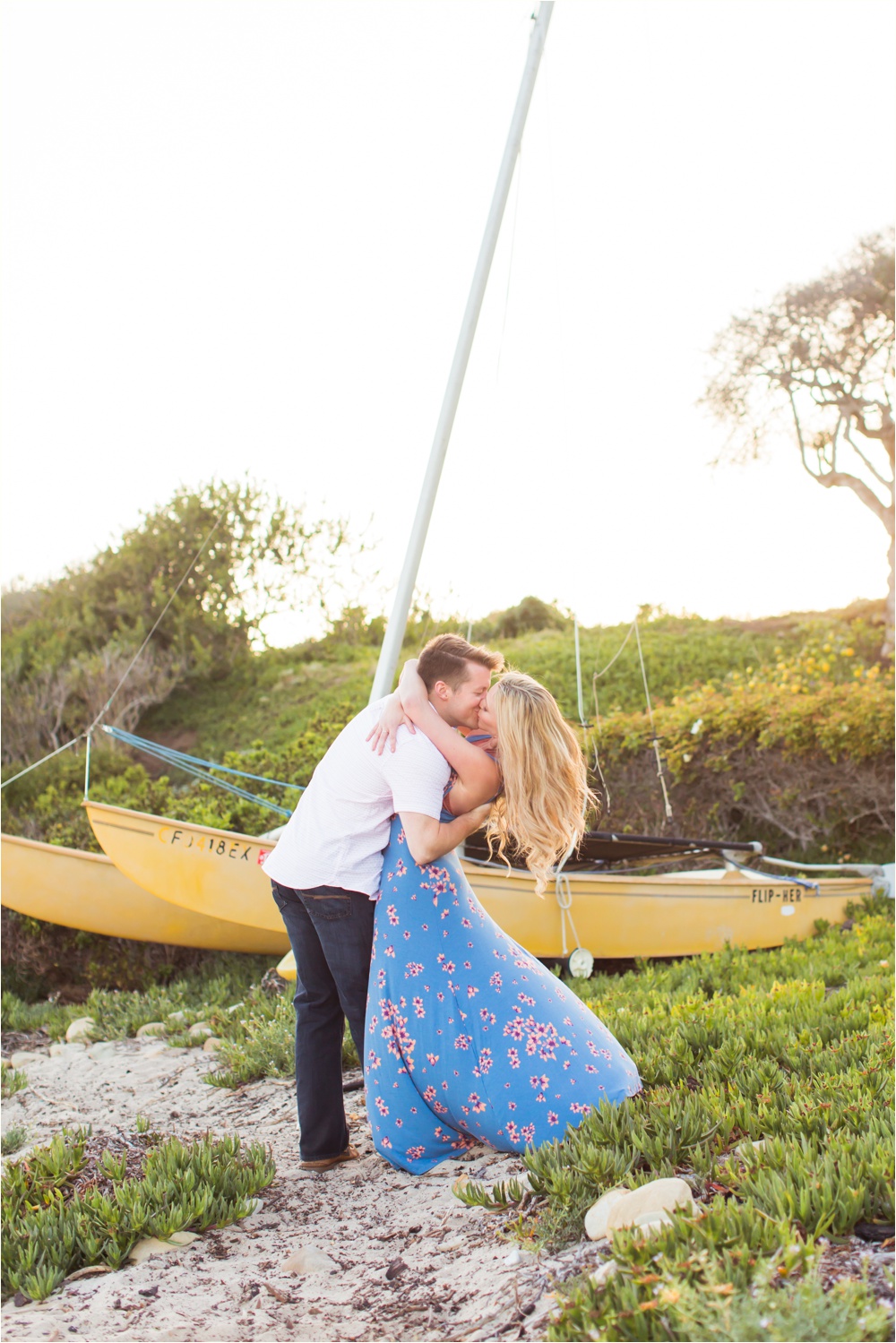 Montecito Engagement Session Couple Kissing by Boat