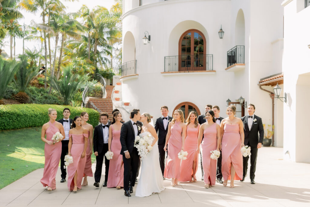 Full bridal party portrait under the Rotunda at the Bacara in Santa Barbara