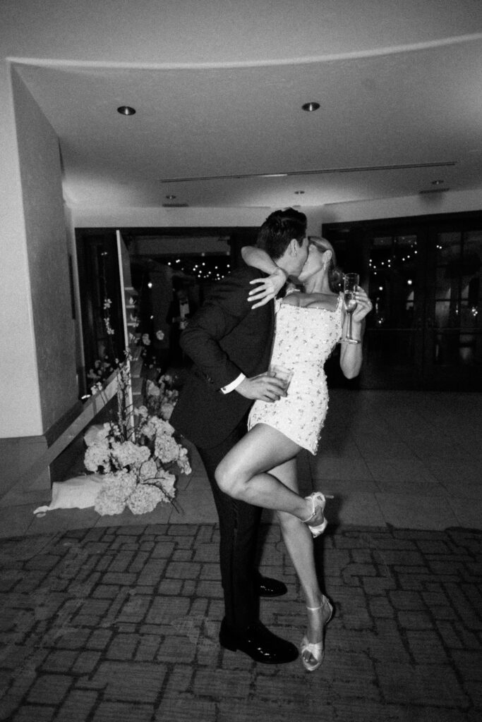 Bride and groom share a kiss at the Bacara wedding reception 