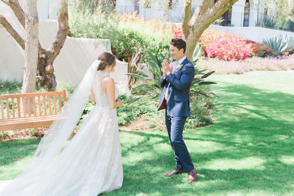 Groom reacts to seeing his bride for the first time at the Bacara