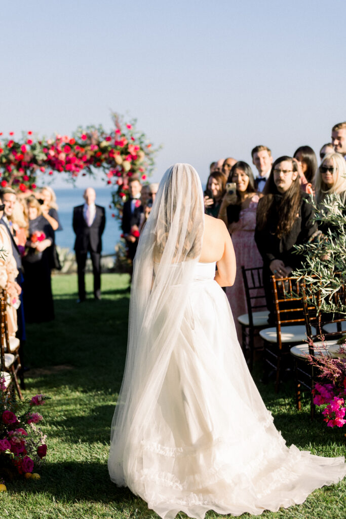 Bride walks down aisle at her Bacara Wedding in Santa Barbara